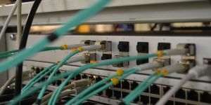 A human hand connecting glowing dots representing serendipity and innovation.