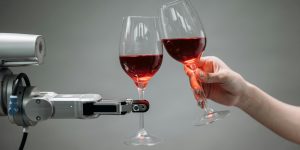 A technician inspecting a humanoid robot in an industrial setting