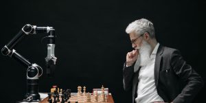 A humanoid robot navigating a messy physical environment with human guidance
