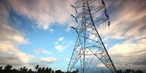 A high-tech energy grid in 2026 showing the infrastructure managed by AI Energy Architects.