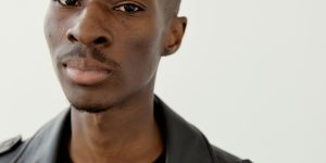 A close-up of a high-tech humanoid robot face representing AGI in 2026.