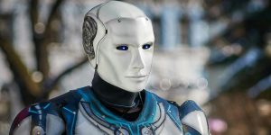 A photorealistic portrait of a humanoid robot with a soft, neutral expression, symbolizing gentle AI and human-centric design in 2026.