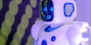 A humanoid robotic hand symbolizing the bridge in the bot-to-bot economy